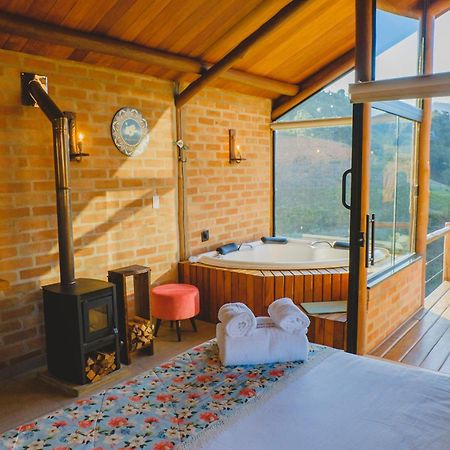 Pousada Ho'Oponopono Chalets & Wine Sapucaí-Mirim Buitenkant foto